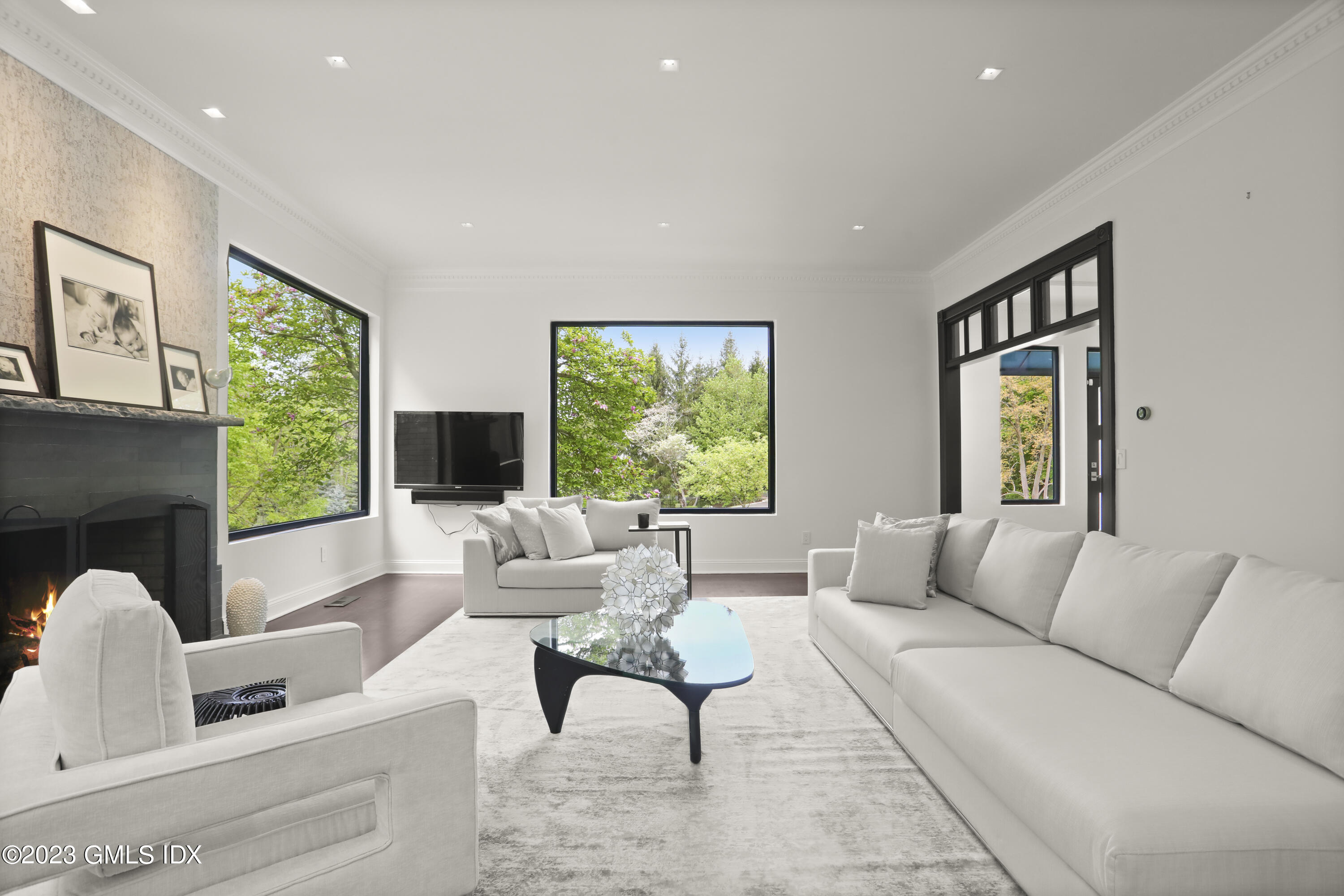 56 Dingletown Road Greenwich, CT 06830 - Photo 6 of 38 a living room with furniture large window and flat screen tv