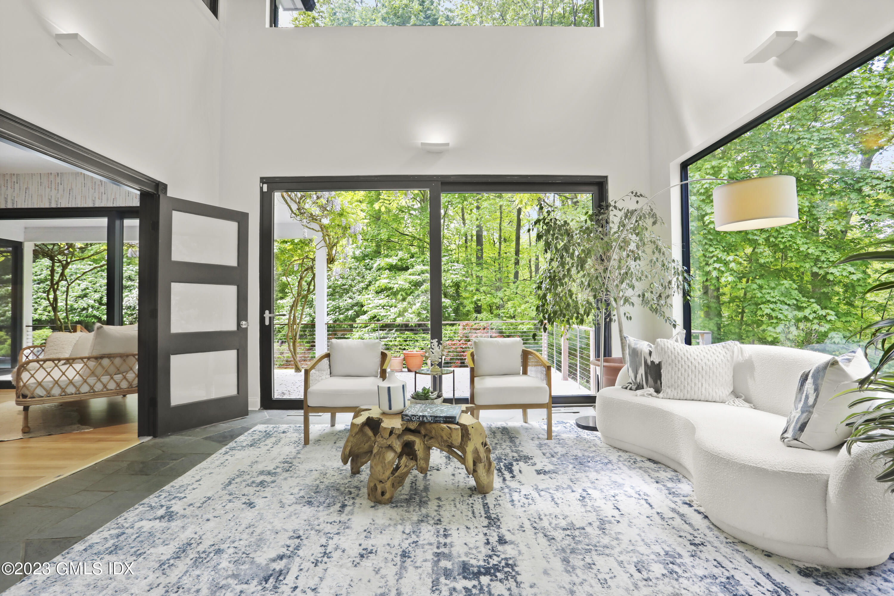 56 Dingletown Road Greenwich, CT 06830 - Photo 7 of 38 a living room with furniture and a large window