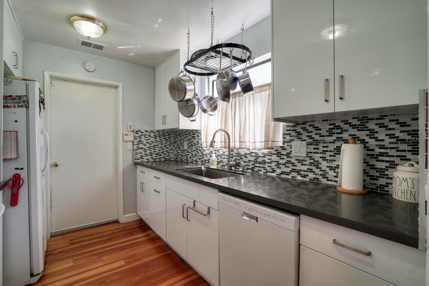 3744 Adriatic Way Santa Clara, CA 95051 - Photo 13 of 34 a kitchen with a sink and cabinets
