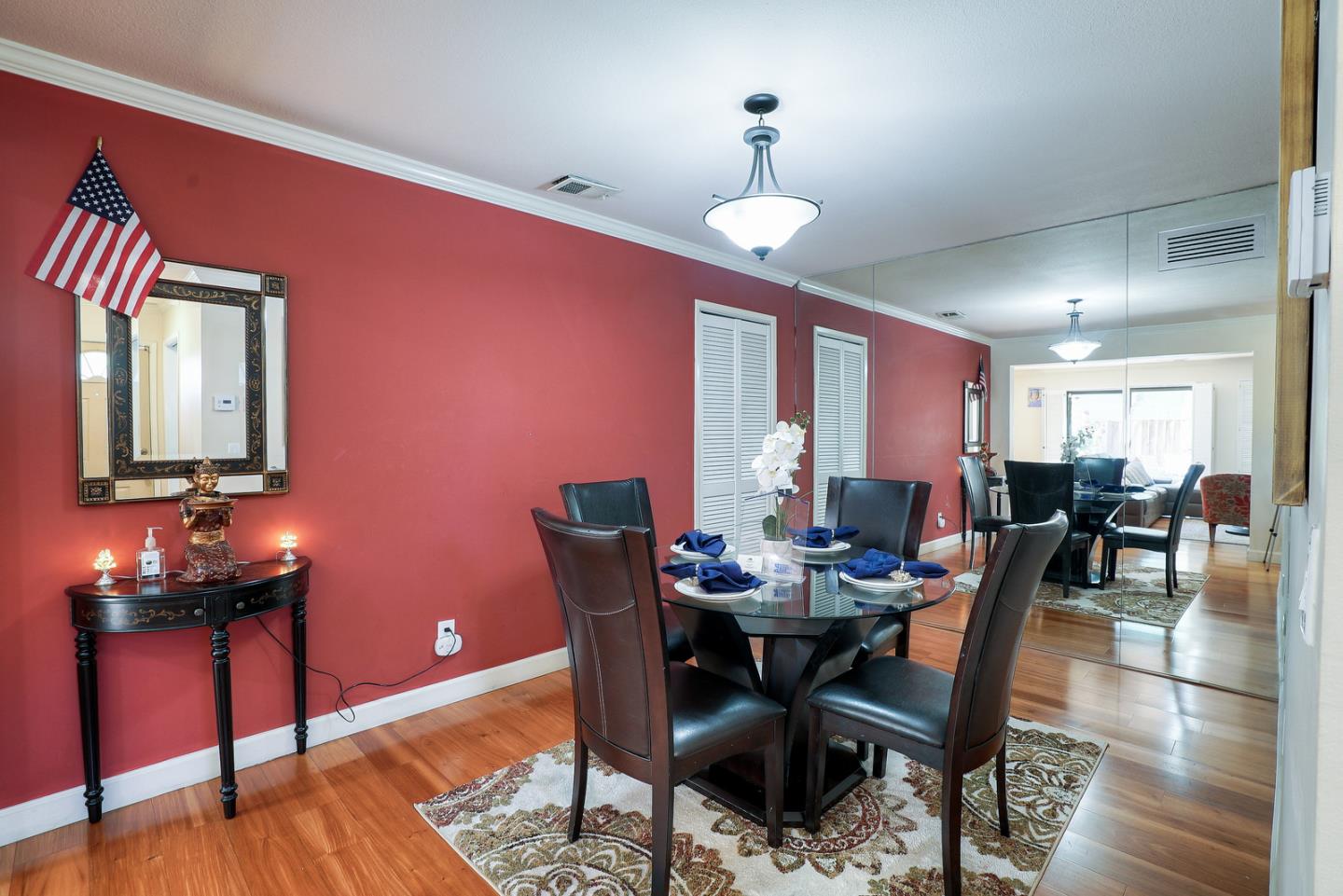 3744 Adriatic Way Santa Clara, CA 95051 - Photo 16 of 34 a view of a dining room with furniture and wooden floor