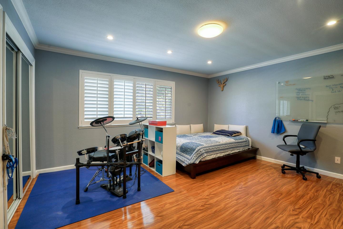 3744 Adriatic Way Santa Clara, CA 95051 - Photo 19 of 34 a bedroom with furniture and a wooden floor