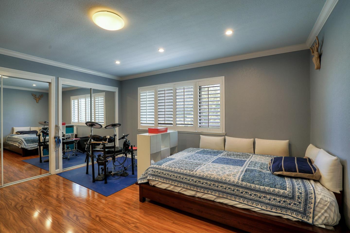 3744 Adriatic Way Santa Clara, CA 95051 - Photo 21 of 34 a bedroom with a bed and a table