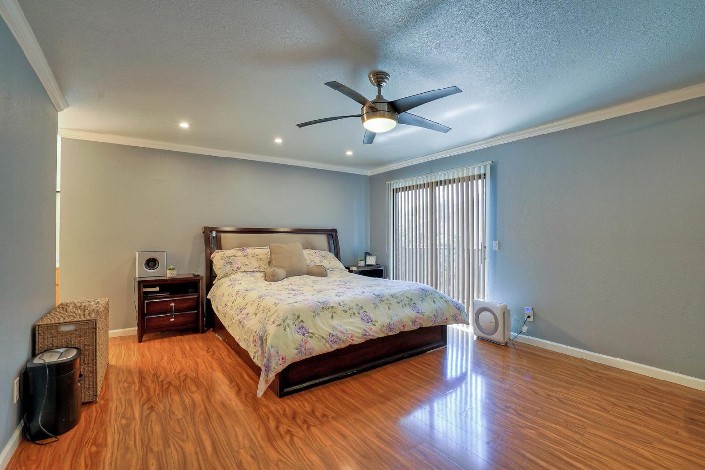 3744 Adriatic Way Santa Clara, CA 95051 - Photo 22 of 34 a bedroom with a bed and wooden floor