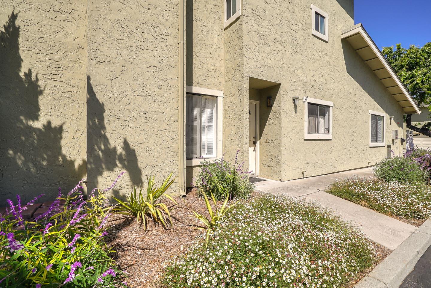 3744 Adriatic Way Santa Clara, CA 95051 - Photo 3 of 34 a front view of a house with a yard