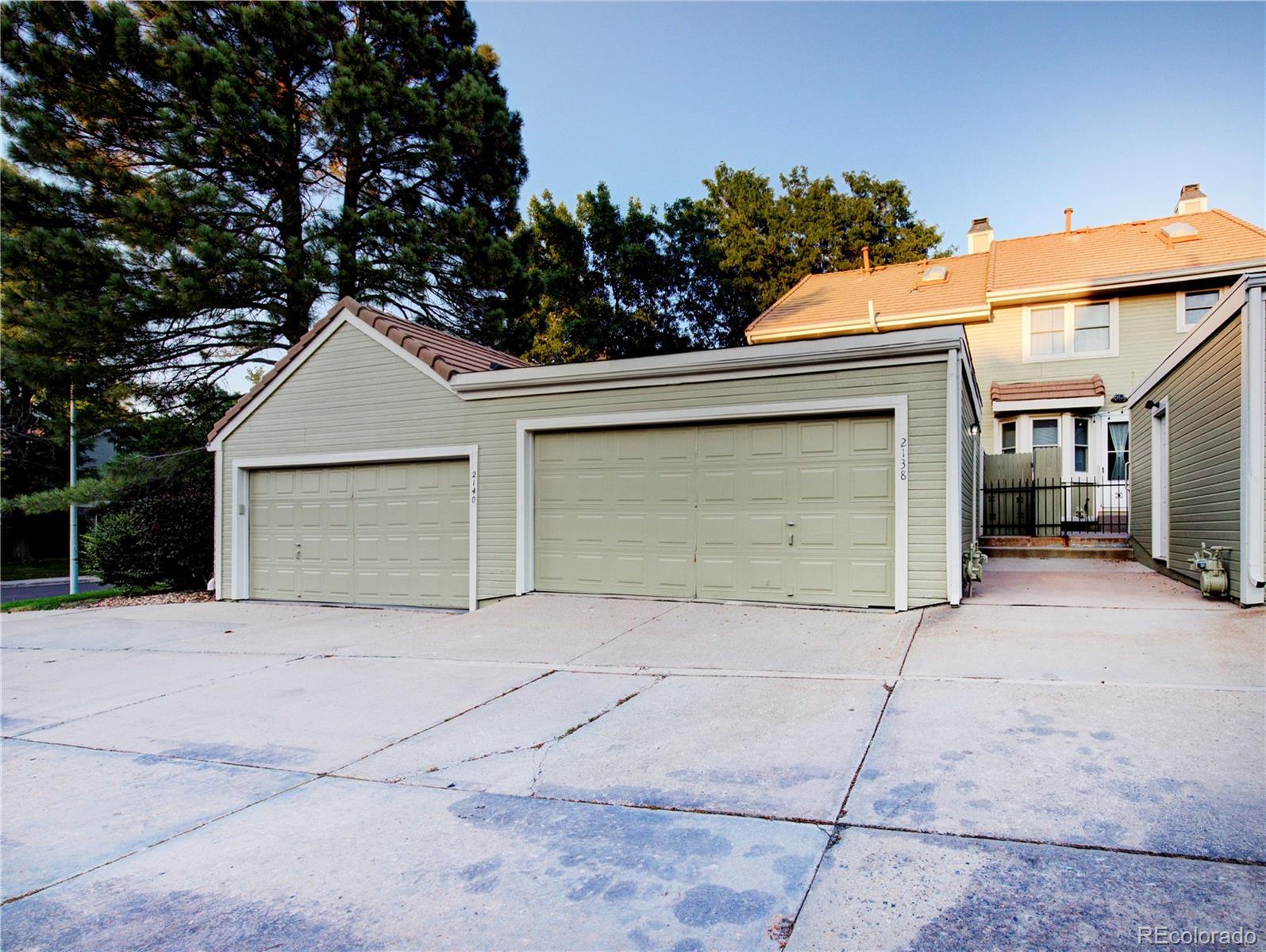 2138 Ranch Drive Westminster, CO 80234 - Photo 29 of 31 a view of garage yard and tree