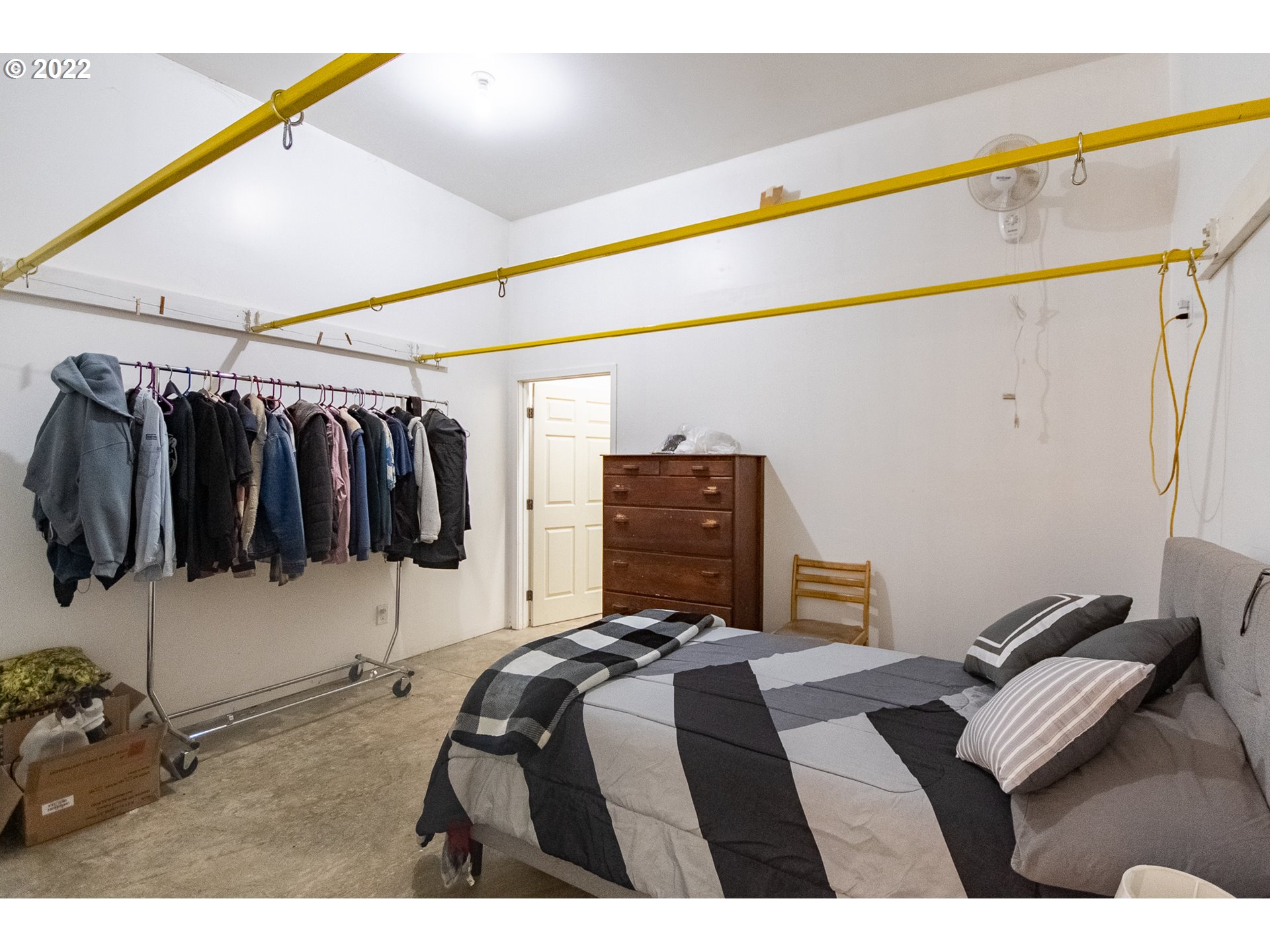 350 Bunker Hill Road Longview, WA 98632 - Photo 12 of 28 a bedroom with a bed and walk in closet