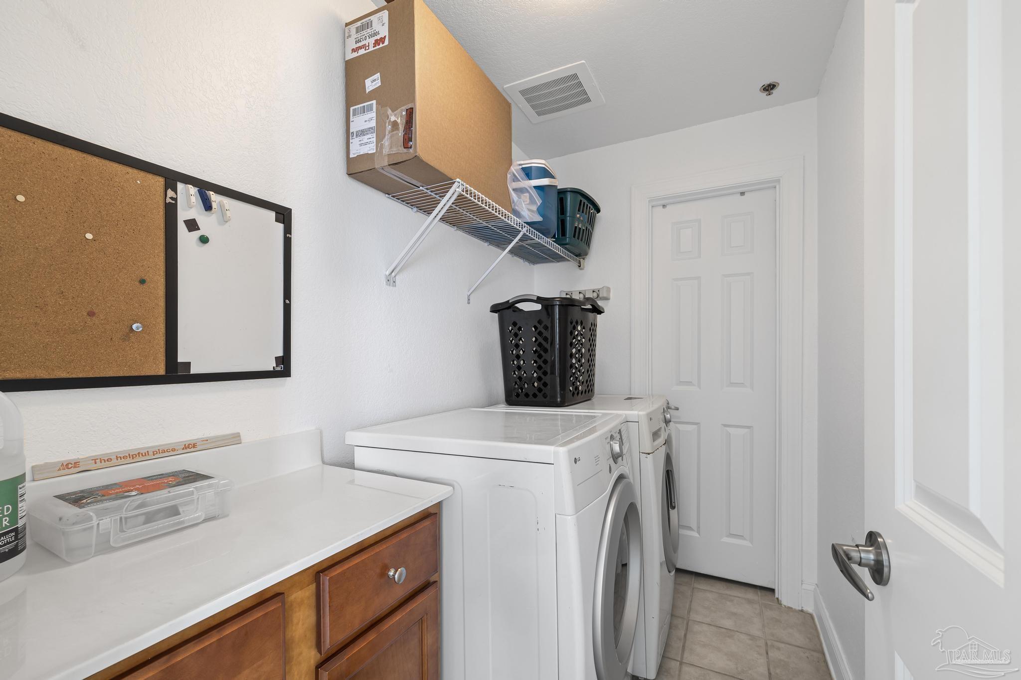 850 Fort Pickens Road, Unit 1230 Pensacola Beach, FL 32561 - Photo 14 of 67 a utility room with dryer and washer