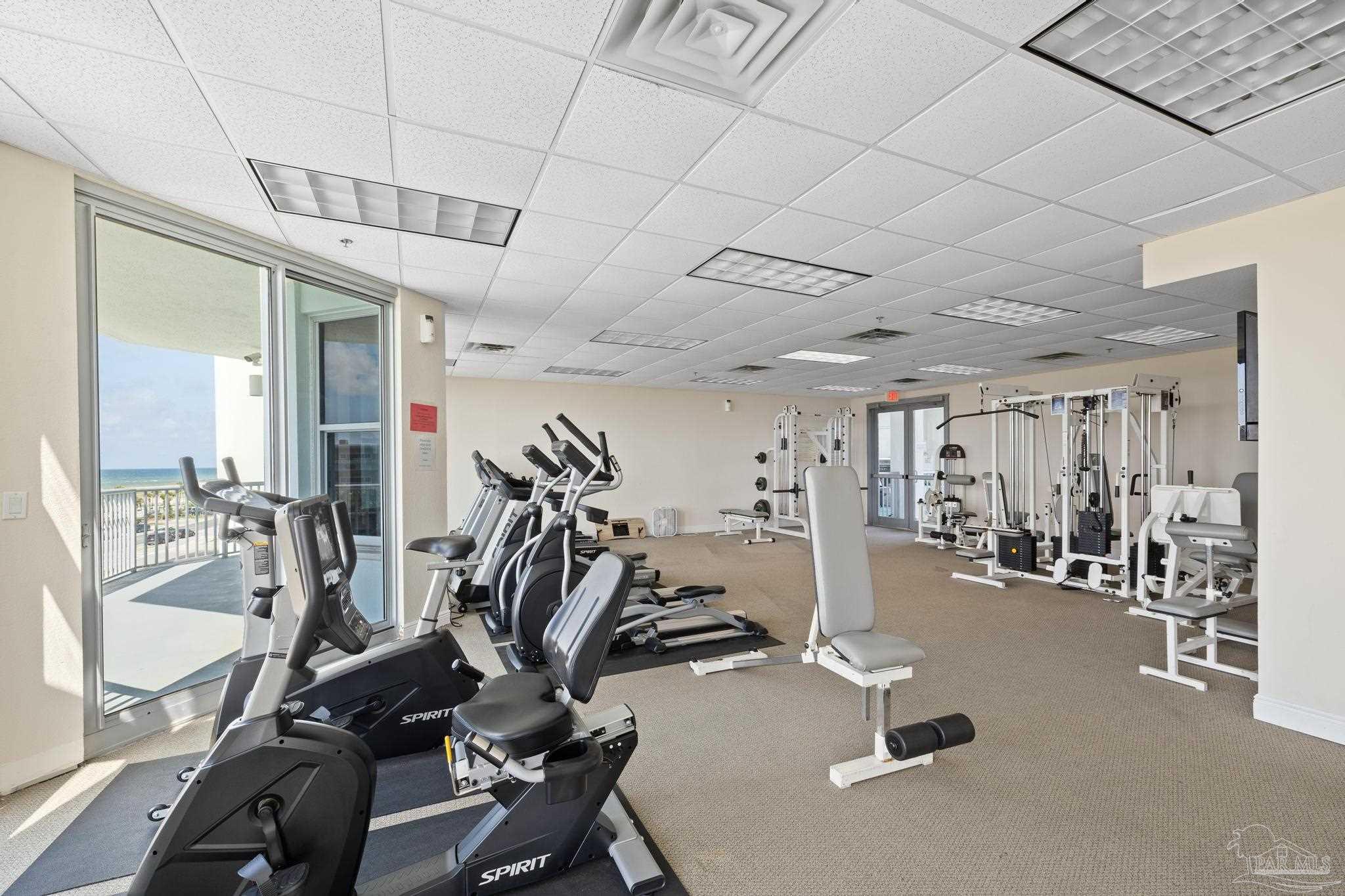 850 Fort Pickens Road, Unit 1230 Pensacola Beach, FL 32561 - Photo 41 of 67 a view of a room with gym equipment