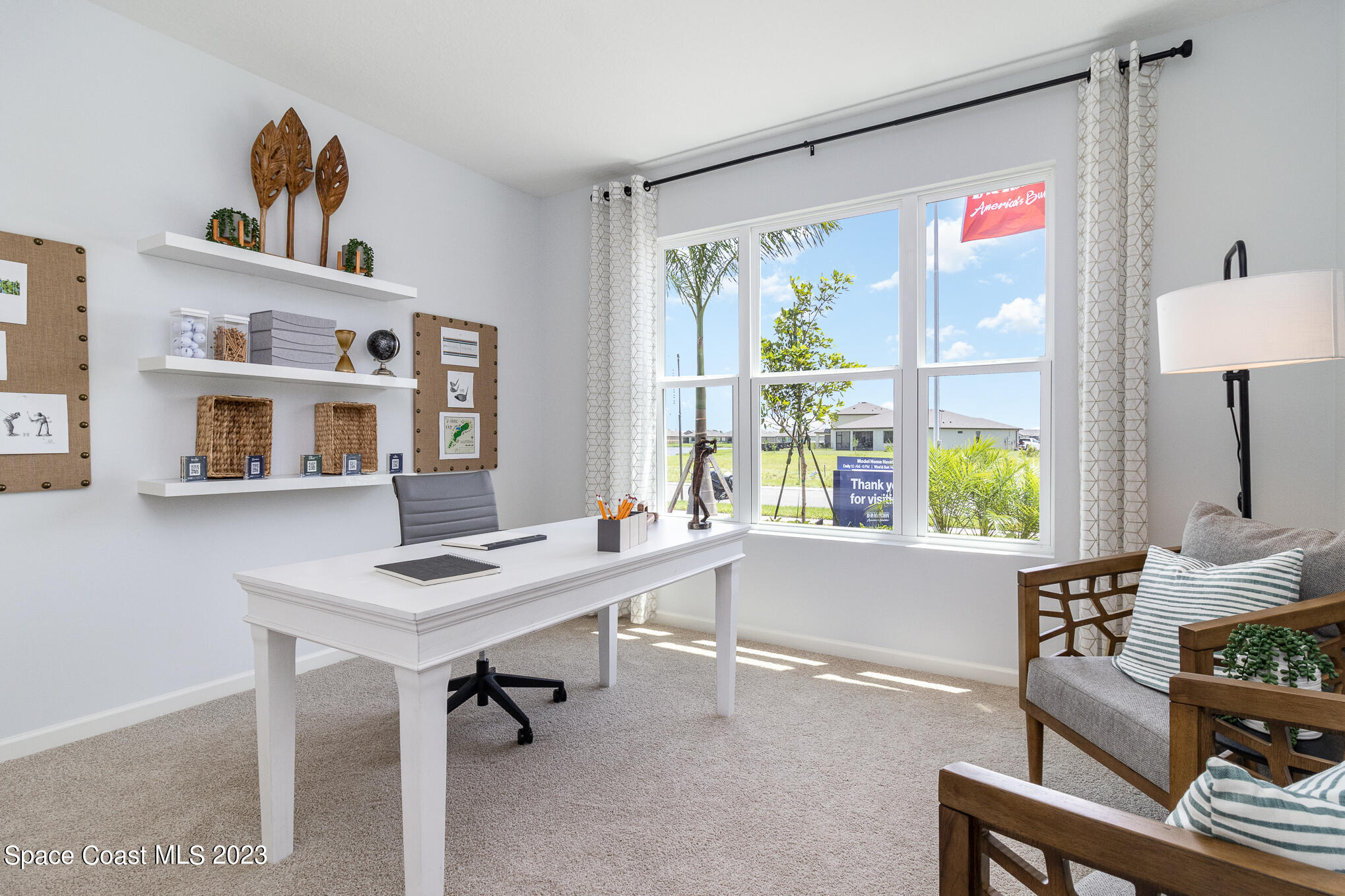 6901 Cameo Drive Grant, FL 32949 - Photo 11 of 48 a workspace with furniture and a window
