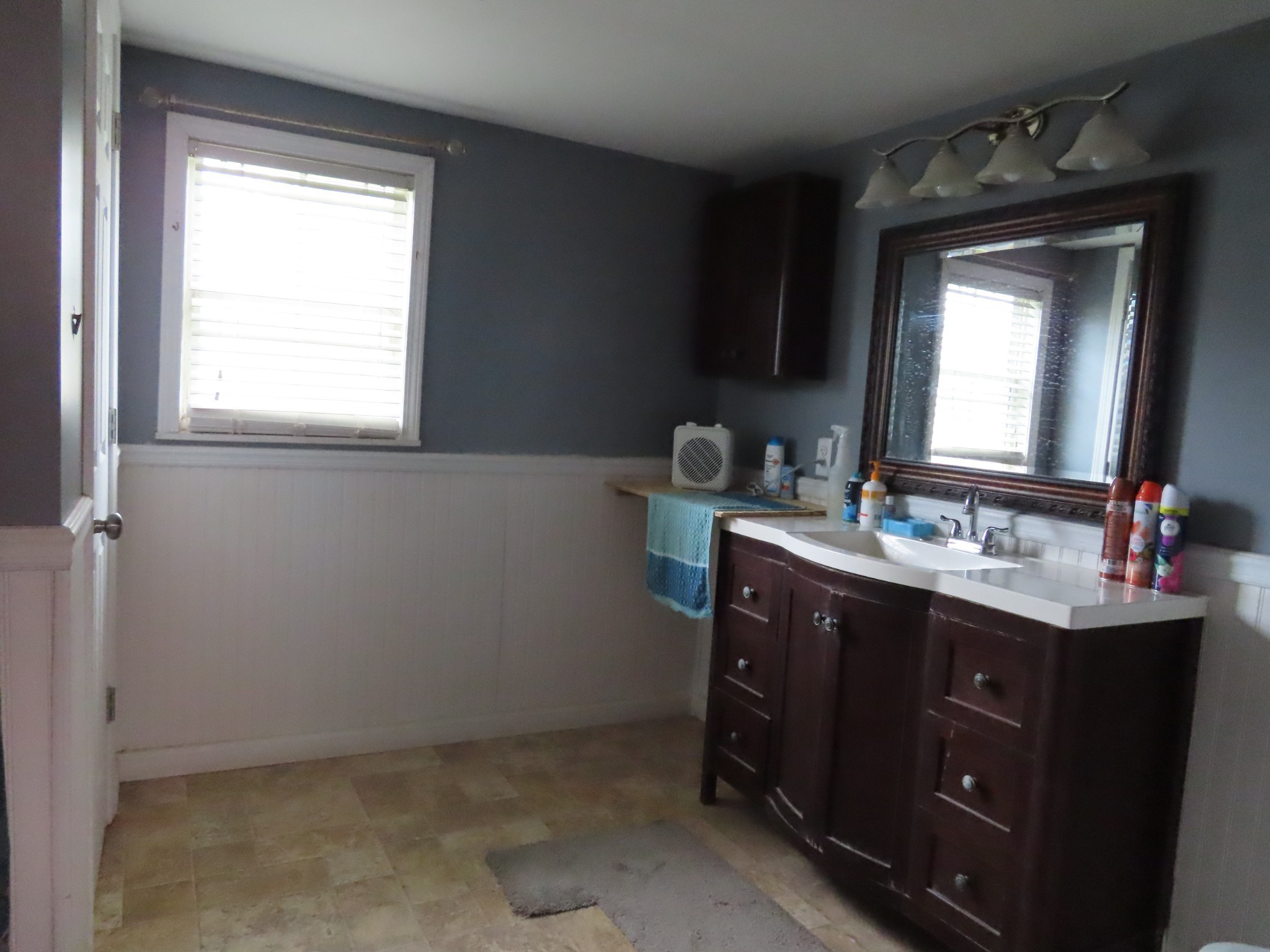 1263 Union Camp Road Lafayette, TN 37083 - Photo 19 of 22 a bathroom with a toilet sink and mirror