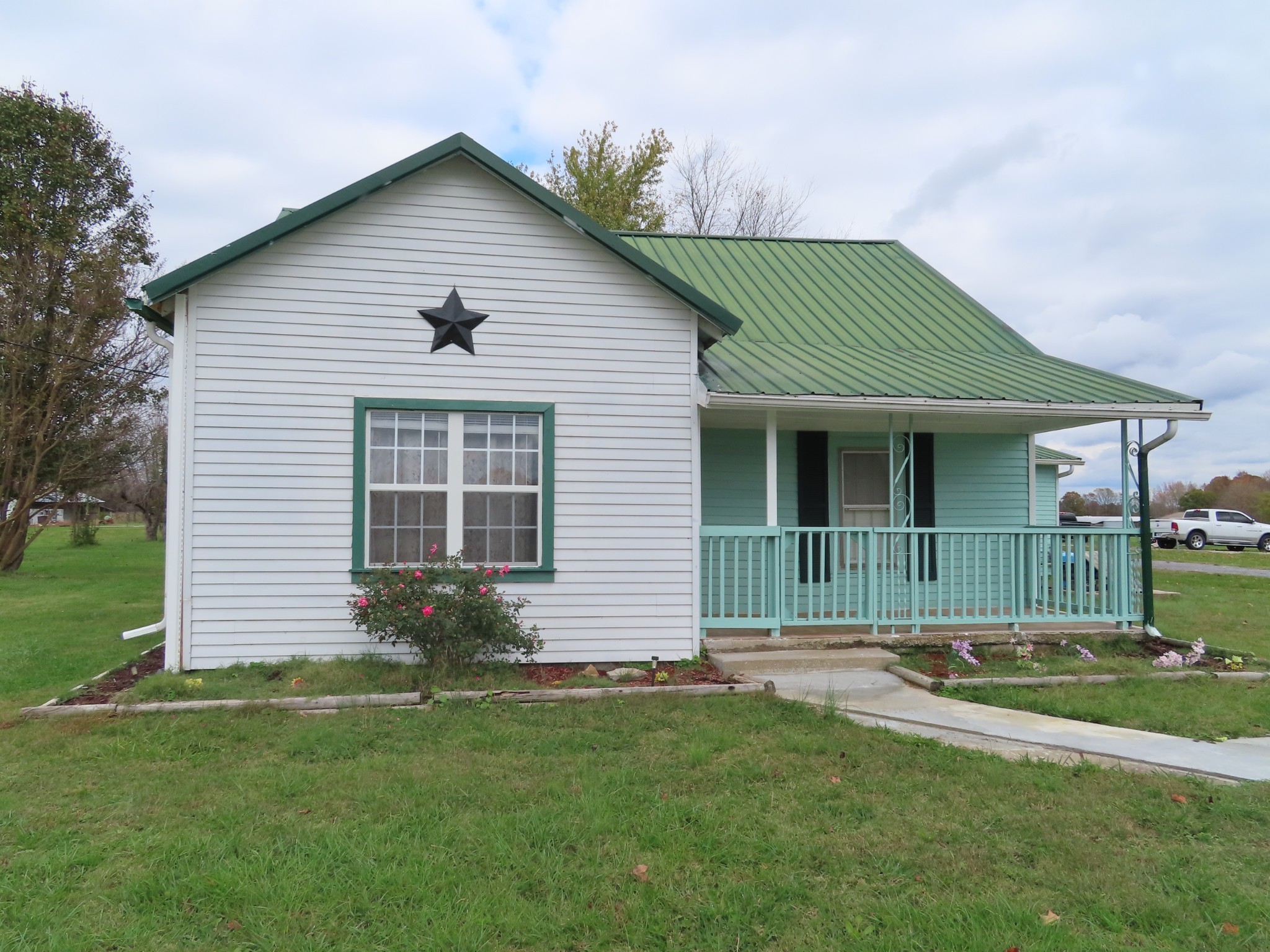 1263 Union Camp Road Lafayette, TN 37083 - Photo 9 of 22 a front view of a house with a yard