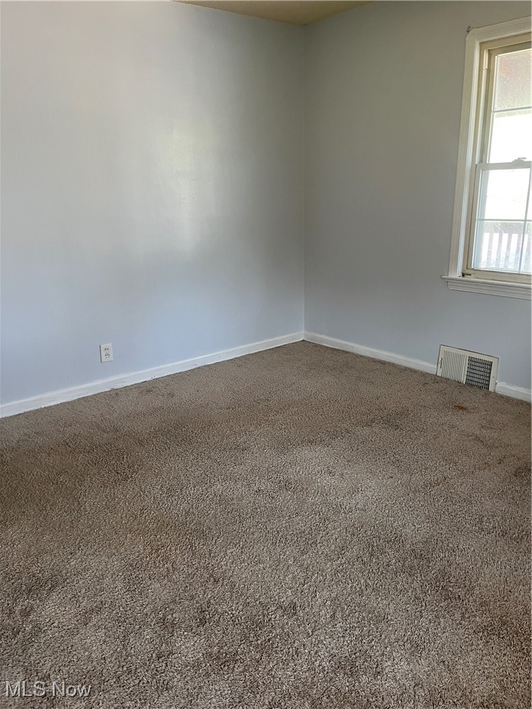 13000 Rockside Road Cleveland, OH 44125 - Photo 5 of 41 View of carpeted empty room