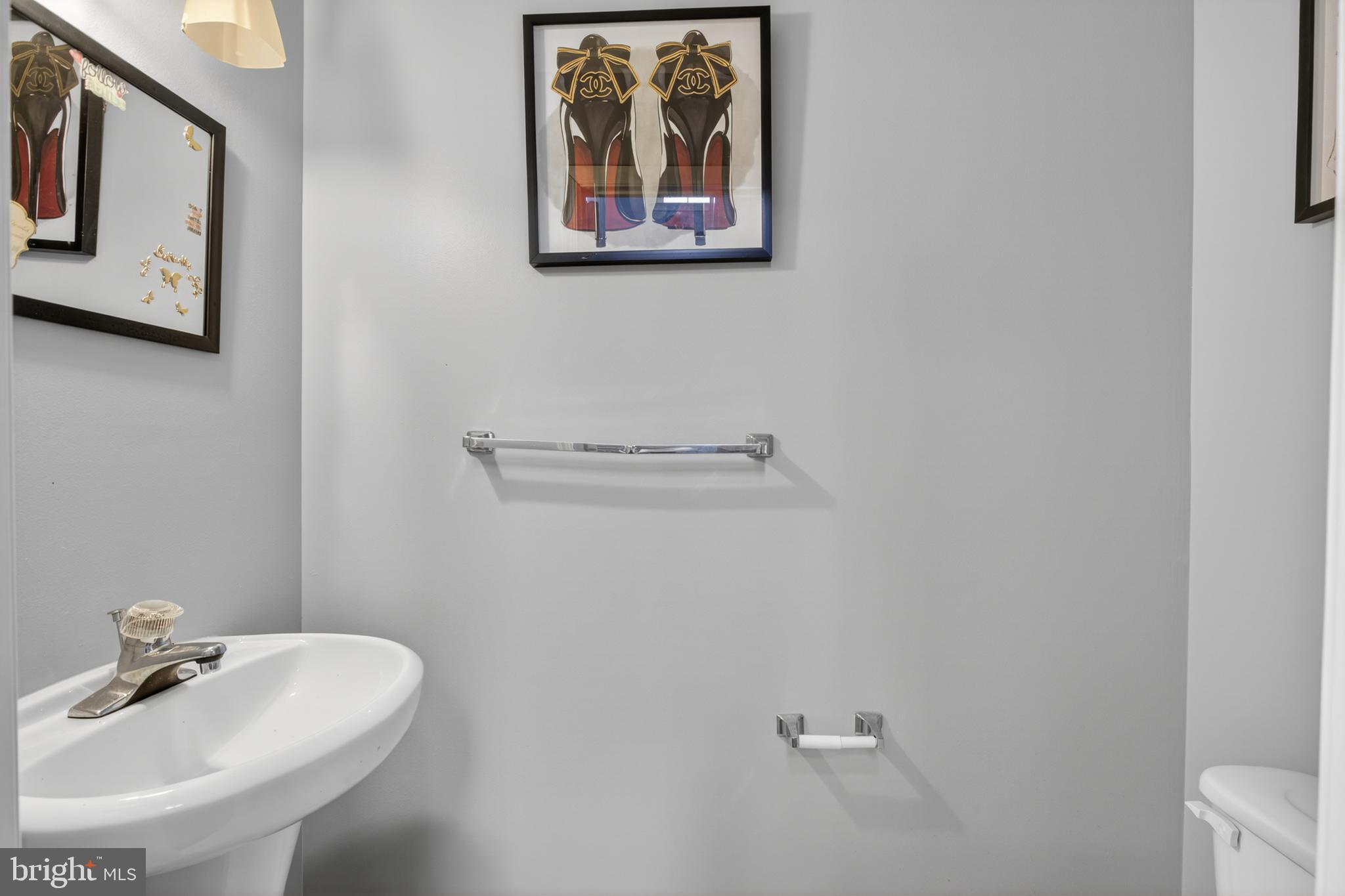 115 Bonnybrook Road Middletown, DE 19709 - Photo 21 of 31 a bathroom with a sink and mirror