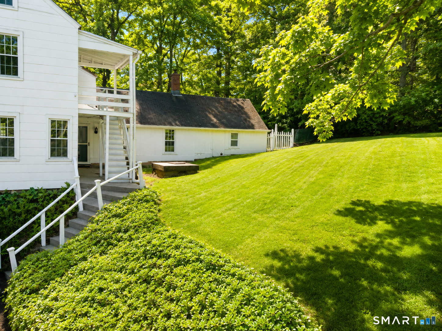 443 Amity Road Bethany, CT 06524 - Photo 5 of 30 a front view of a house with yard