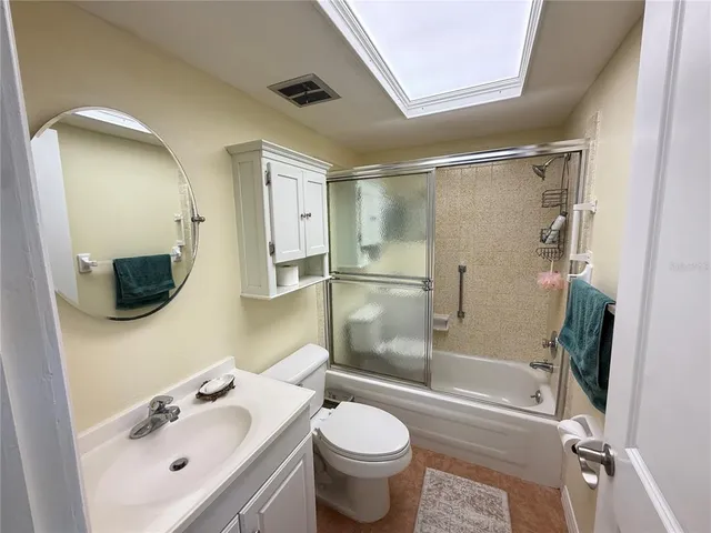 a view of a porch with a floor to ceiling window