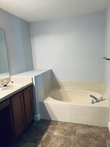 a bathroom with a shower and toilet