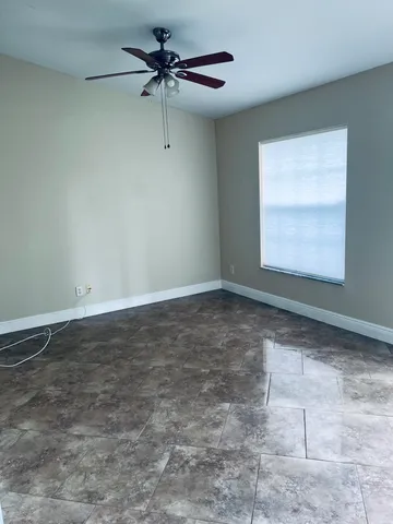 a bathroom with a toilet a sink and bathtub
