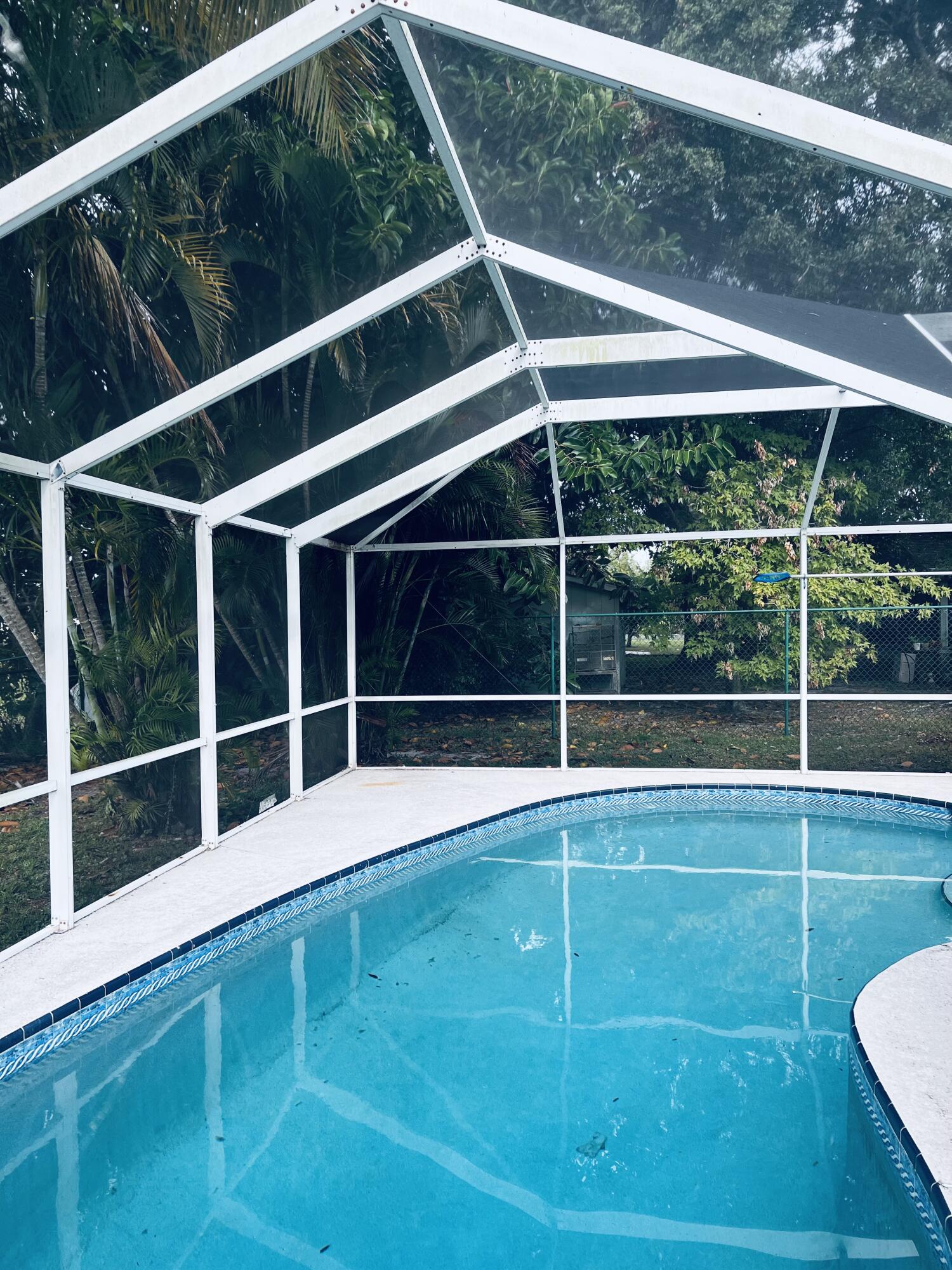 1836 Southeast Fallon Drive Port St. Lucie, FL 34983 - Photo 2 of 3 a view of a tennis court