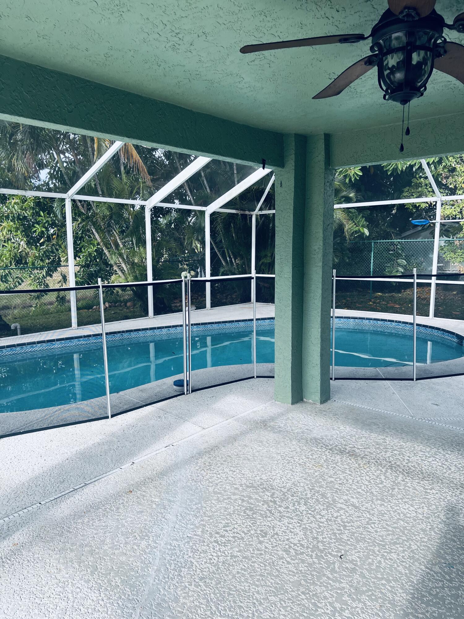 1836 Southeast Fallon Drive Port St. Lucie, FL 34983 - Photo 3 of 3 a view of a tennis court