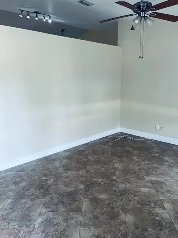 a view of a room with an empty space