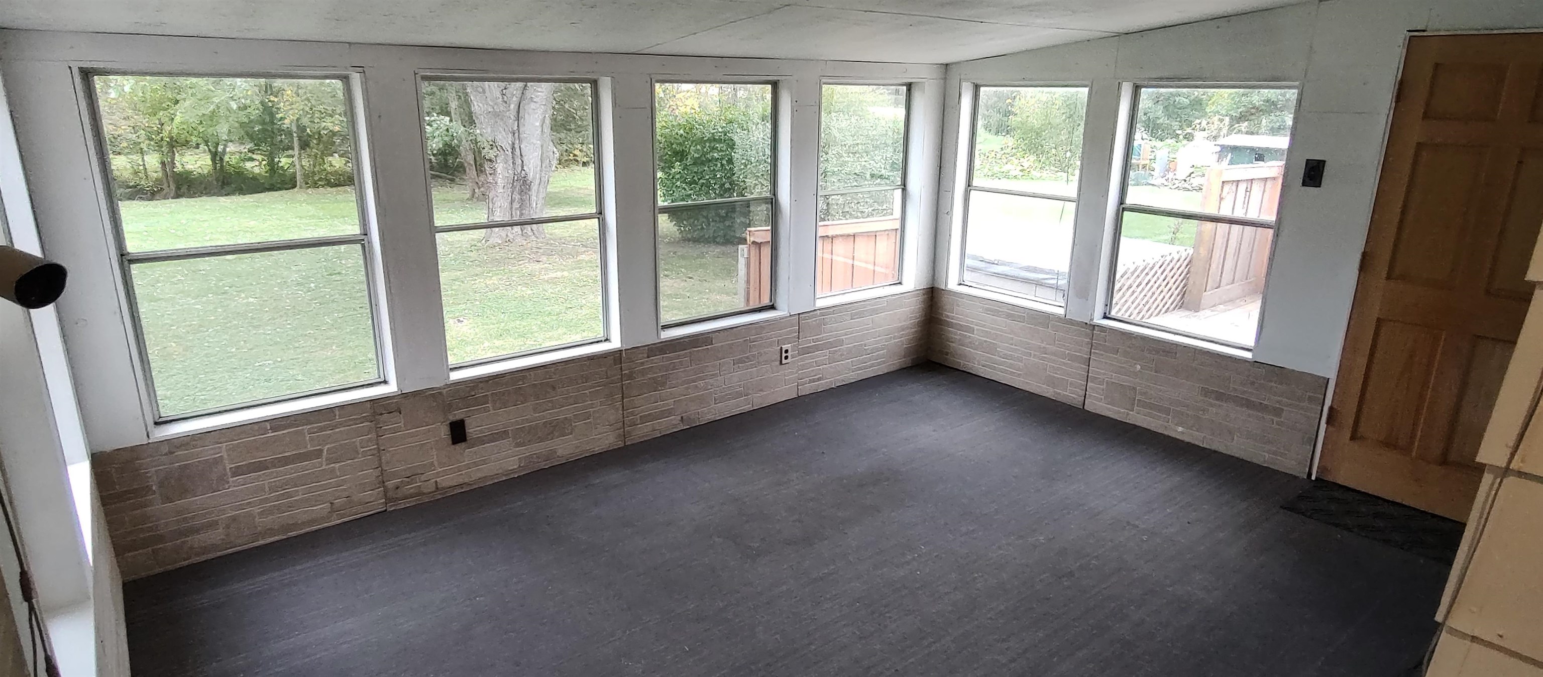 4466 Brookdale Road Rockford, IL 61109 - Photo 32 of 43 a view of an empty room with a window