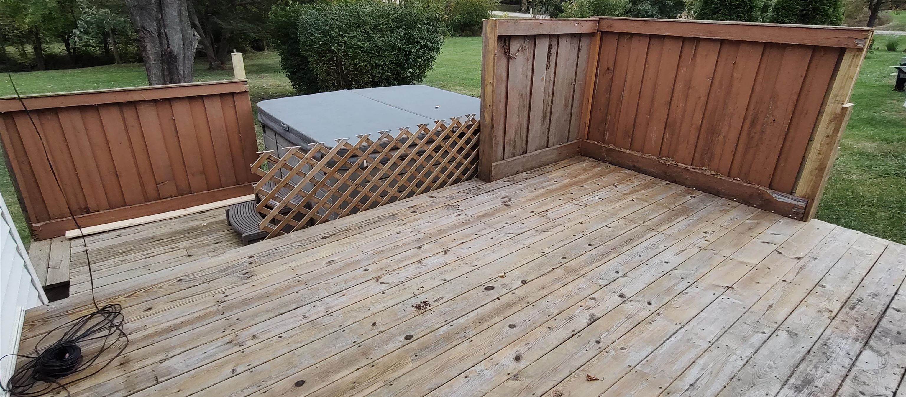 4466 Brookdale Road Rockford, IL 61109 - Photo 37 of 43 a view of a wooden deck