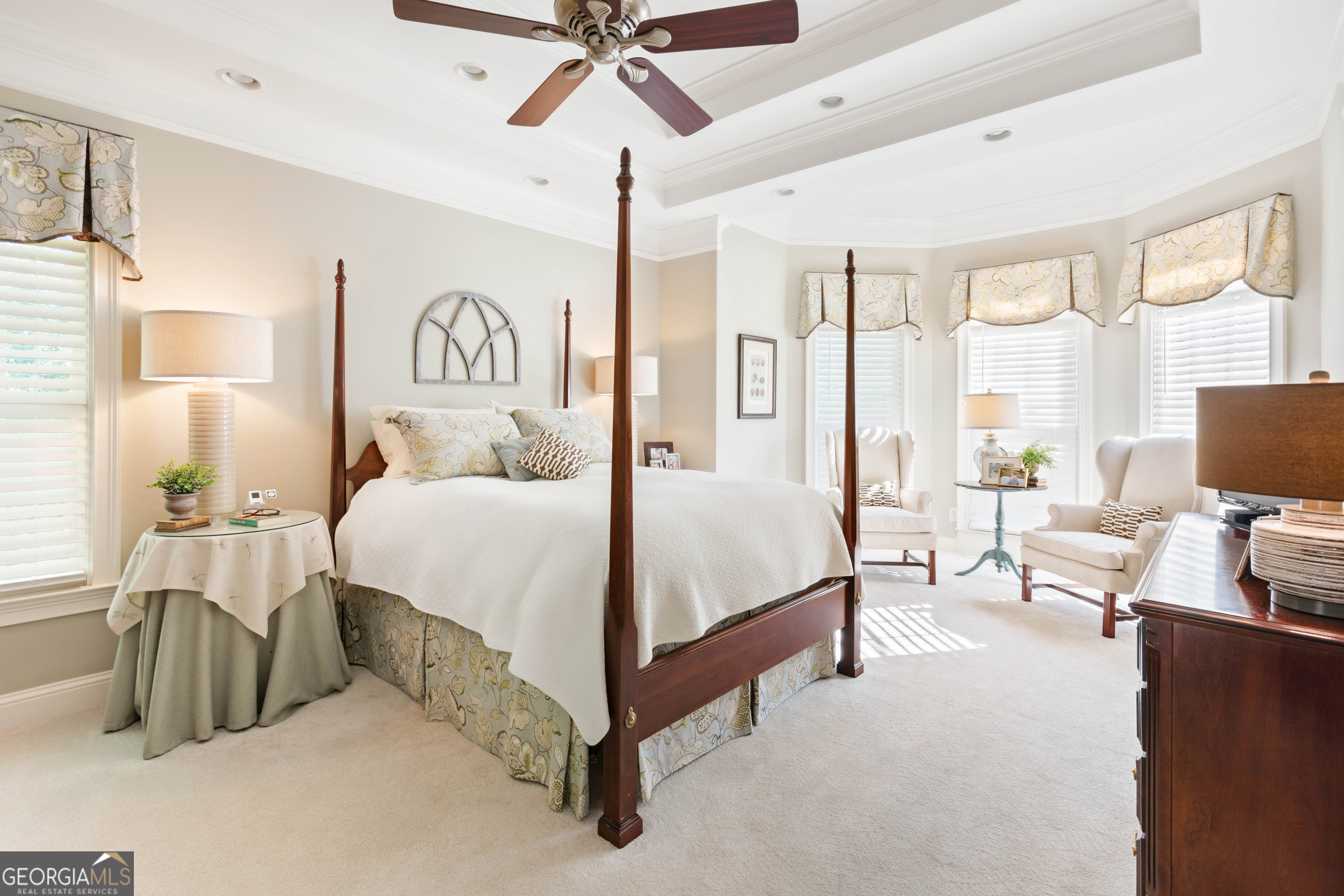 1030 Spring Lake Drive Bishop, GA 30621 - Photo 22 of 53 a bedroom with a bed and a chandelier