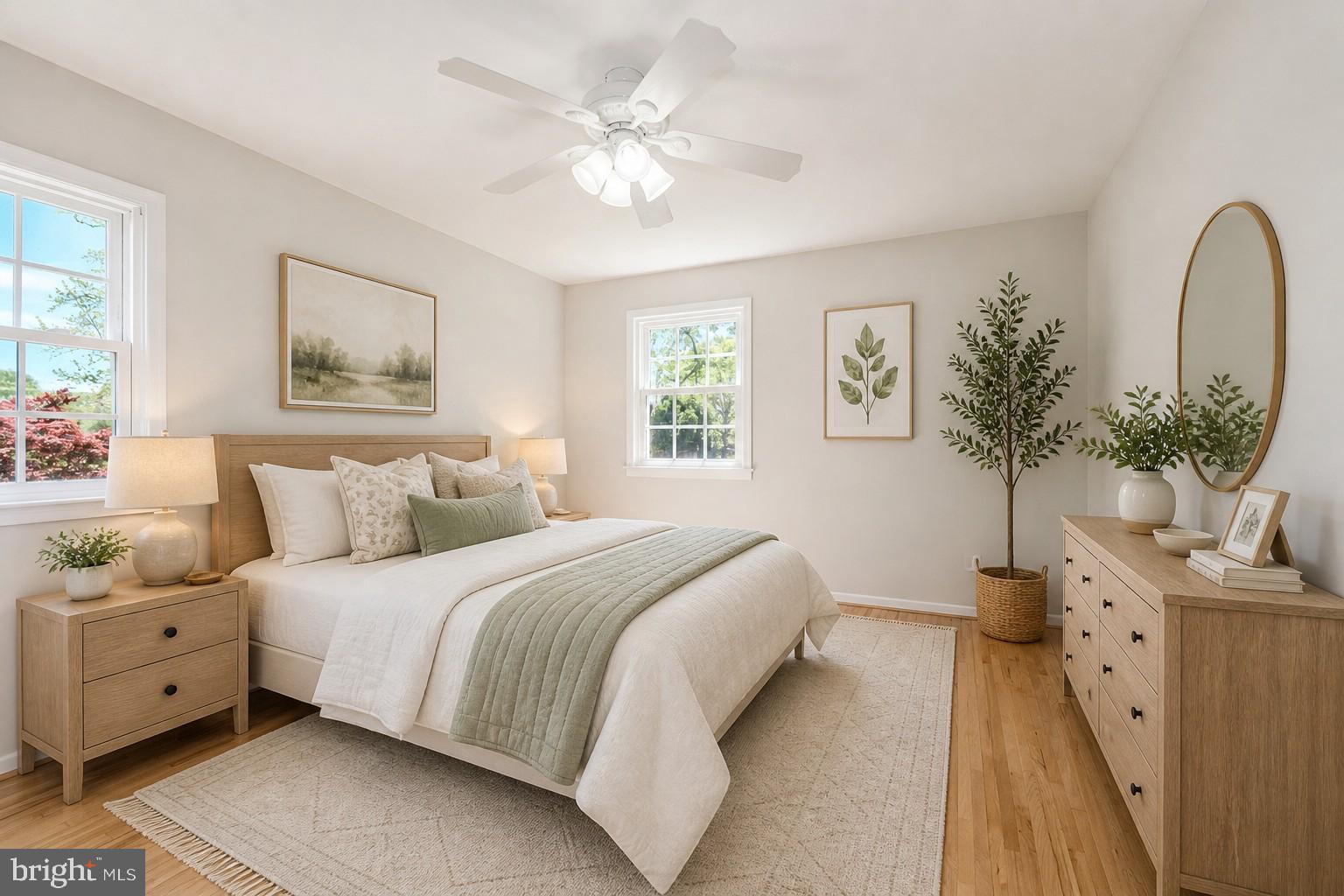 6526 Greenview Lane Springfield, VA 22152 - Photo 12 of 41 a spacious bedroom with a bed and a couch