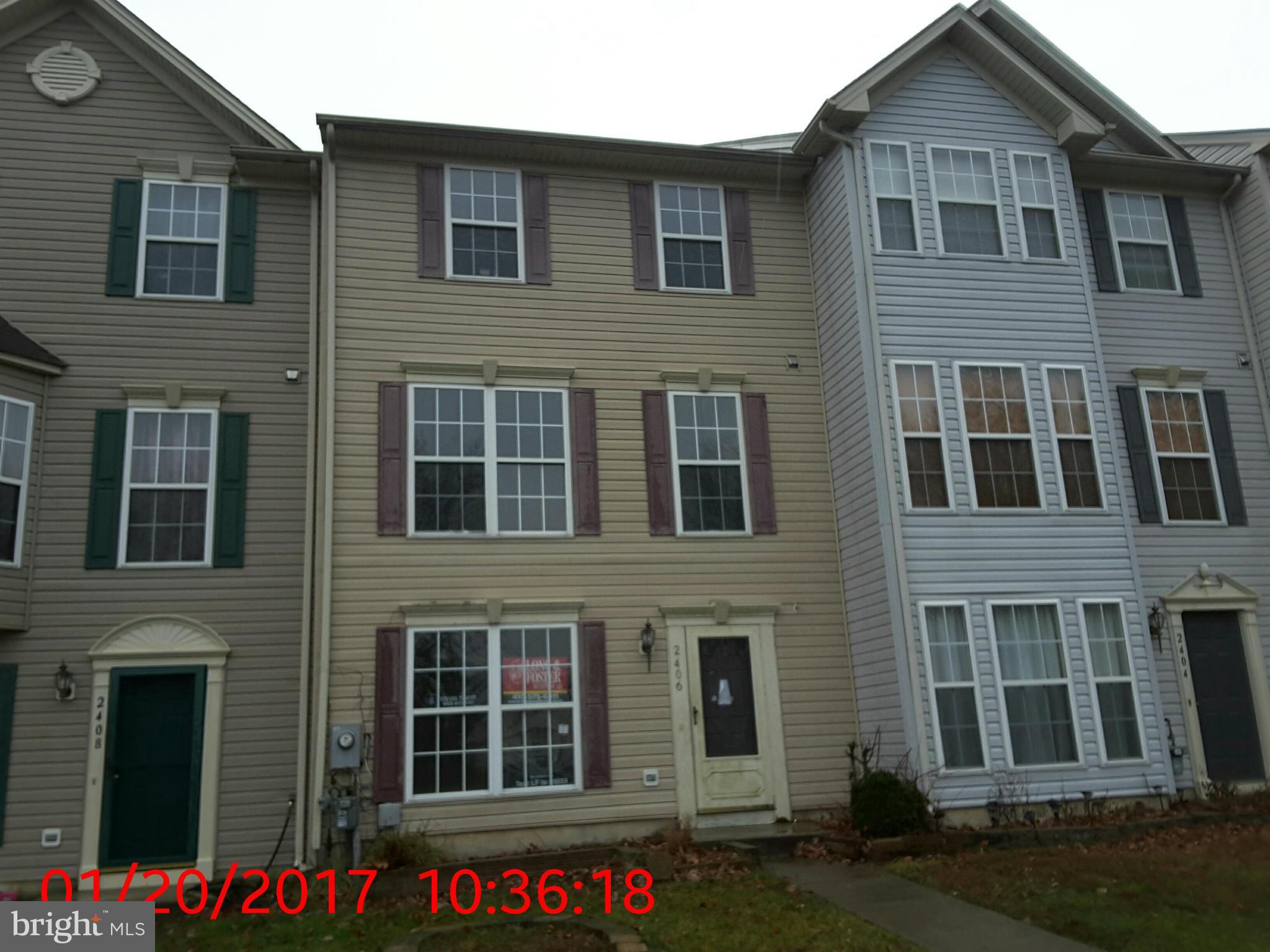 2406 Beaver Crossing Road Edgewood, MD 21040 - Photo 1 of 18 a front view of building with yard