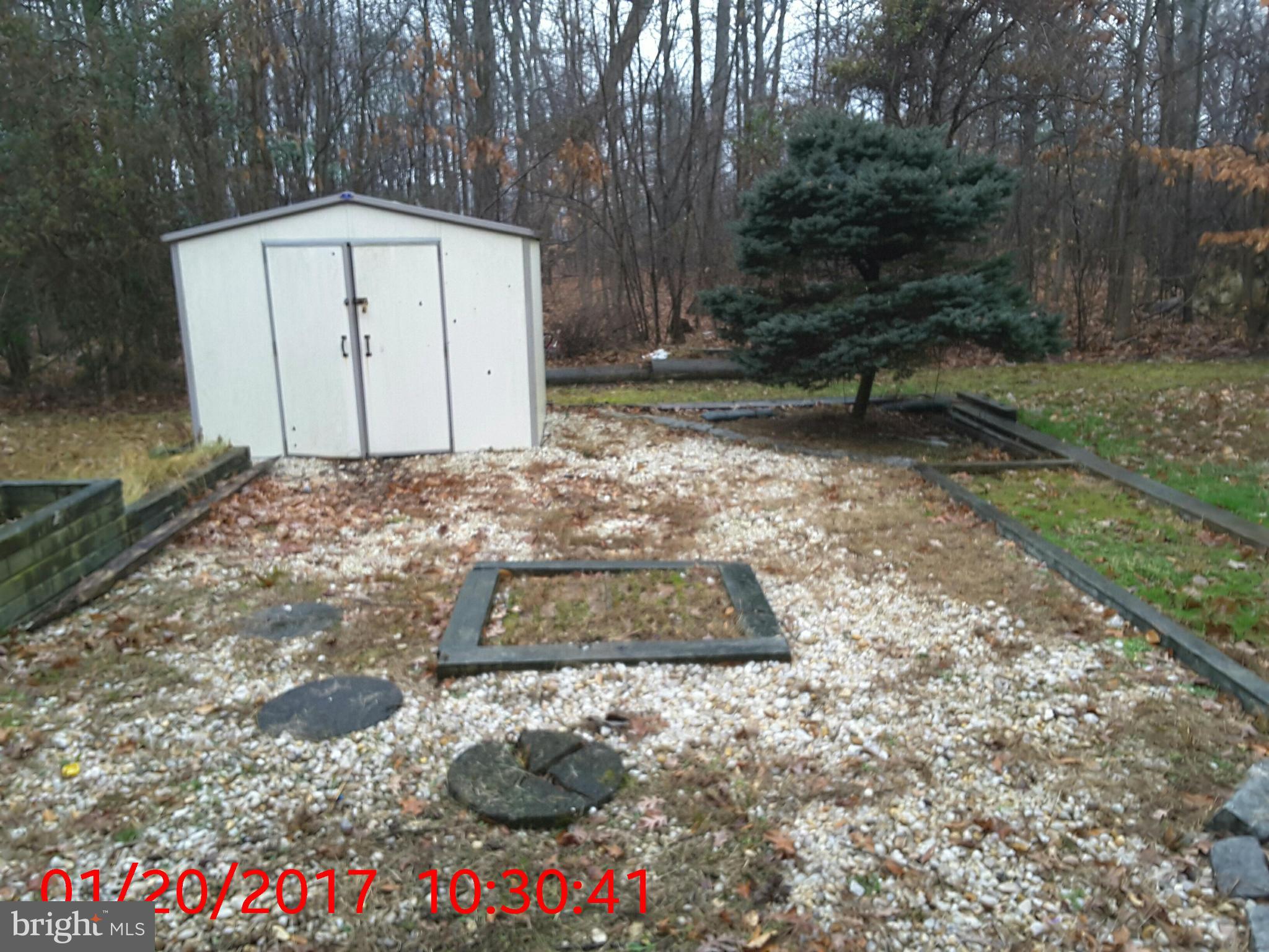 2406 Beaver Crossing Road Edgewood, MD 21040 - Photo 18 of 18 a view of a yard with large trees