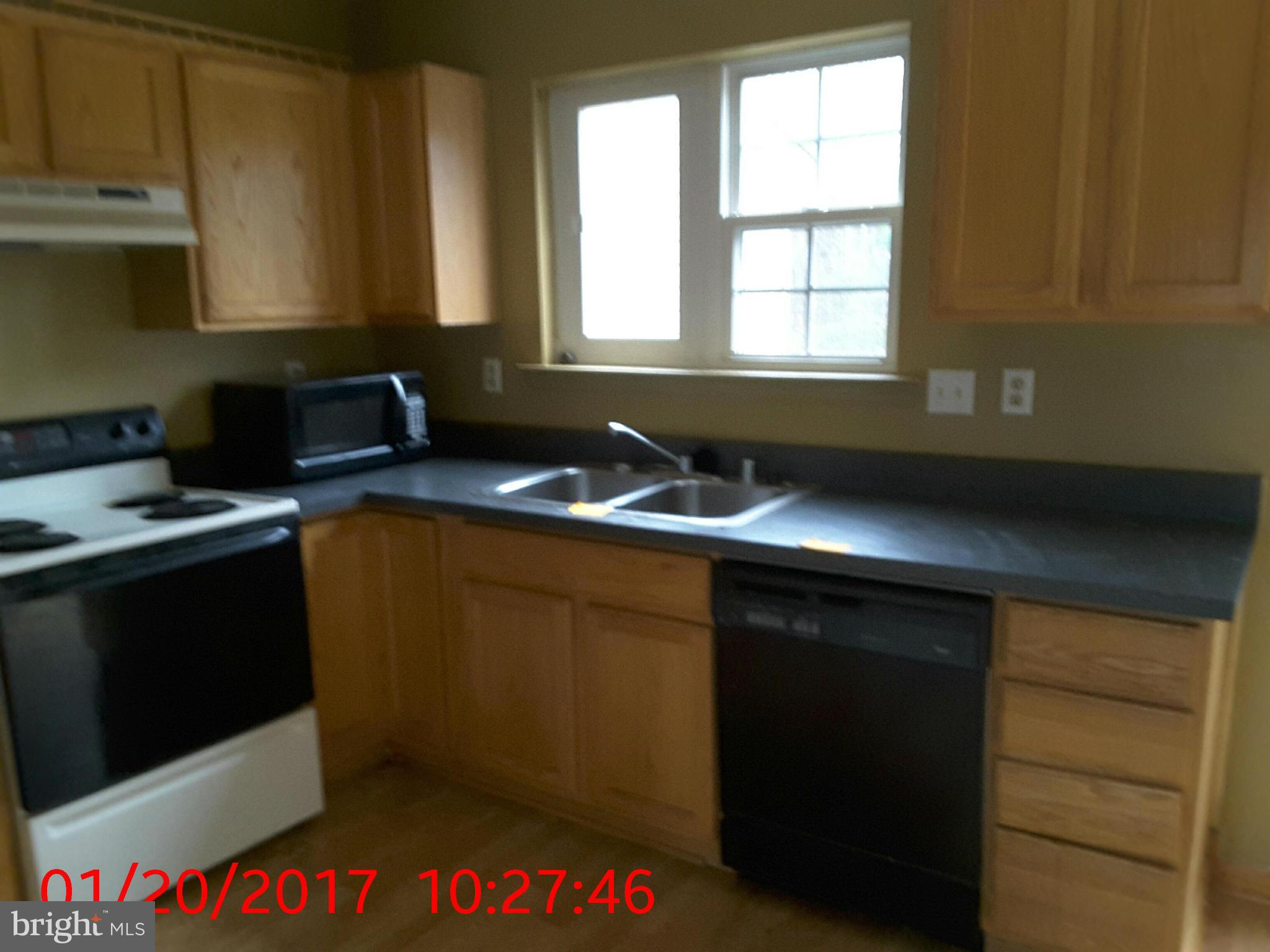 2406 Beaver Crossing Road Edgewood, MD 21040 - Photo 3 of 18 a kitchen with a sink and cabinets