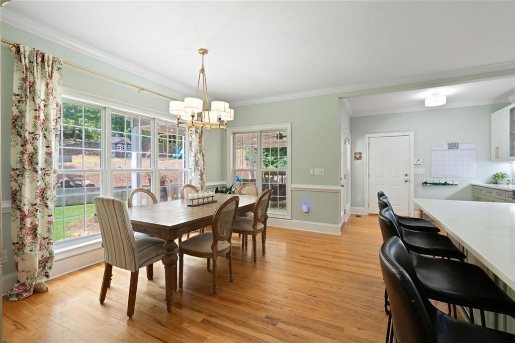 3095 Chattahoochee Trace Gainesville, GA 30506 - Photo 12 of 37 a view of a dining room with furniture window and outside view