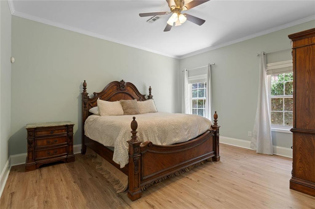 3095 Chattahoochee Trace Gainesville, GA 30506 - Photo 28 of 37 a bedroom with a bed and window