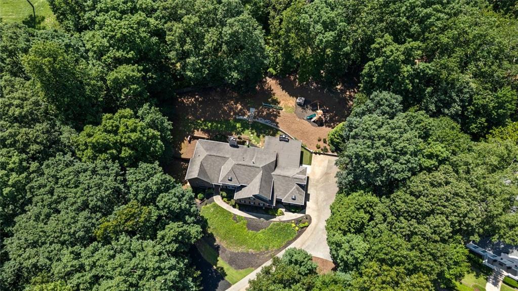 3095 Chattahoochee Trace Gainesville, GA 30506 - Photo 3 of 37 an aerial view of a house with yard swimming pool and outdoor seating