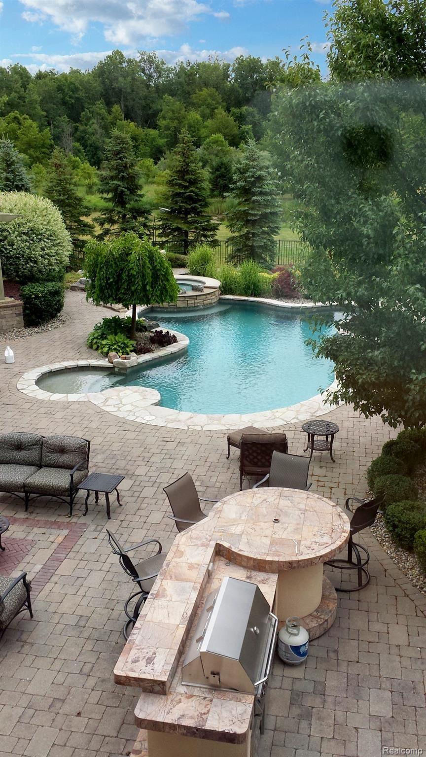 11471 Sharp Road Linden, MI 48451 - Photo 29 of 38 Pool and Grill Area.jpg