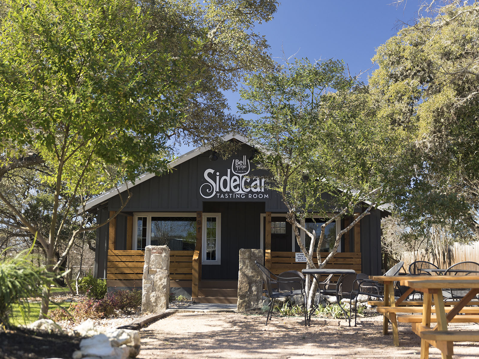 470 El Capitan Loop Dripping Springs, TX 78620 - Photo 21 of 26 a front view of a house with garden