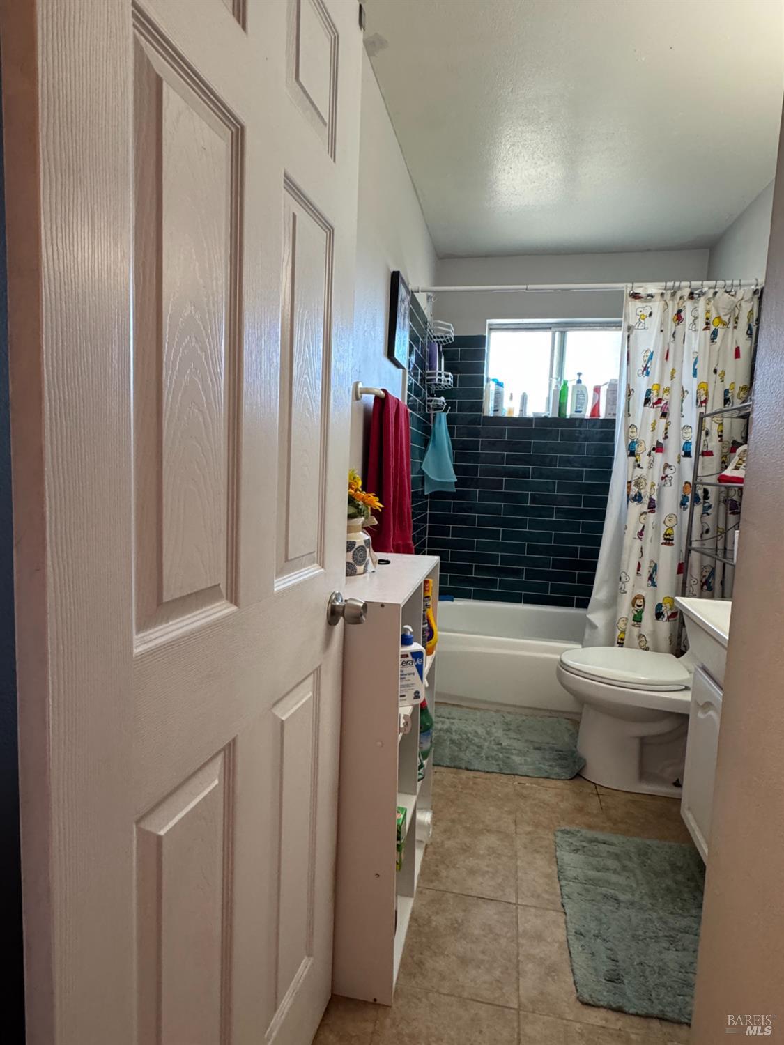 431 Bahia Way San Rafael, CA 94901 - Photo 36 of 46 a bathroom with a toilet and shower