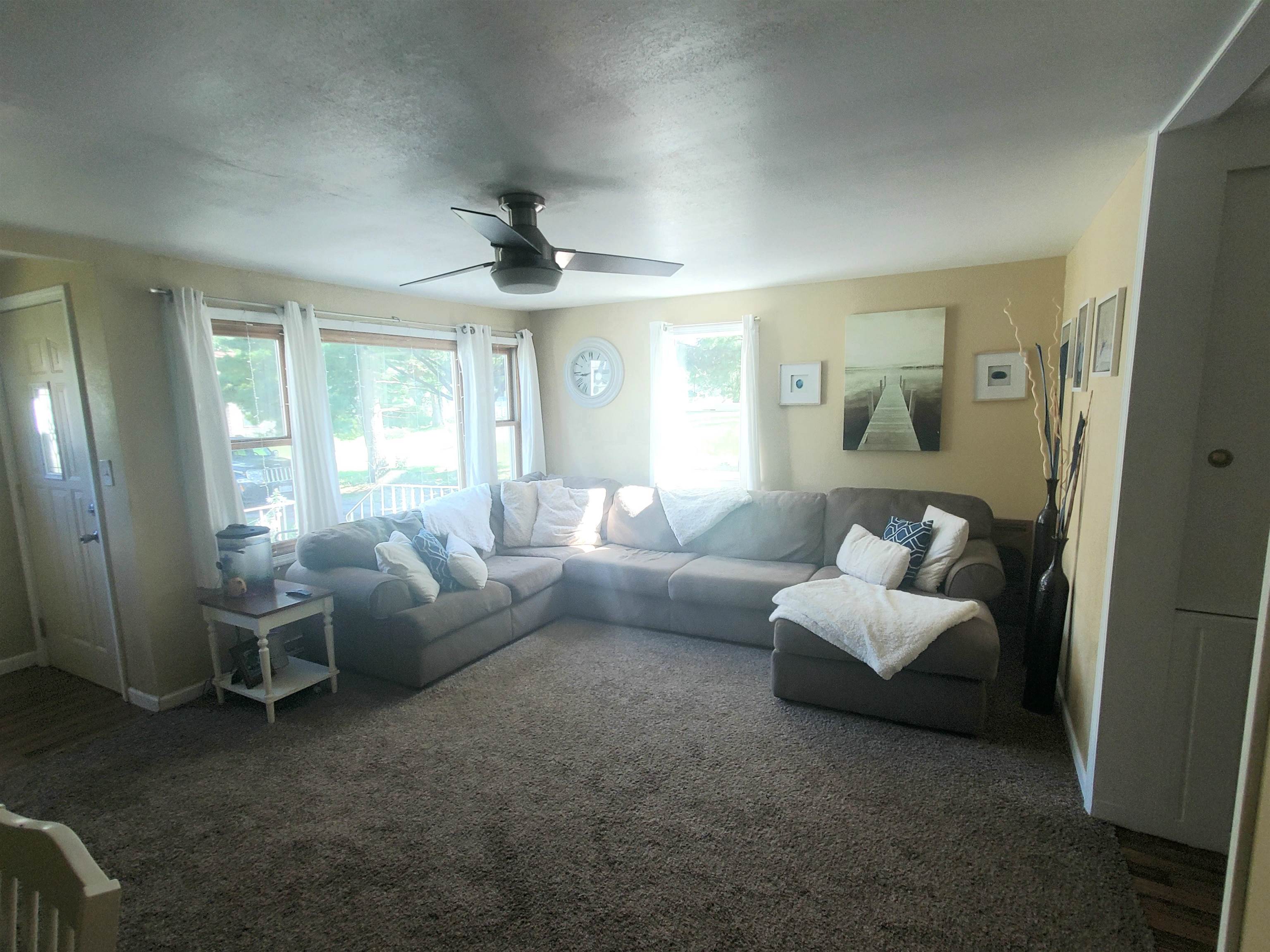 1130 Ritsher Street Beloit, WI 53511 - Photo 5 of 14 a living room with furniture and a large window