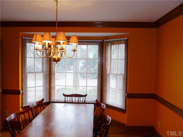 2409 Scouting Trail Raleigh, NC 27615 - Photo 9 of 22 a room with window and wooden floor