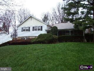 1215 Fleetwood Road Rydal, PA 19046 - Photo 1 of 1 a front view of house with yard and green space