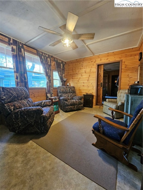 184 Trillium Road Newland, NC 28657 - Photo 3 of 15 a living room with furniture gym equipment and a large window