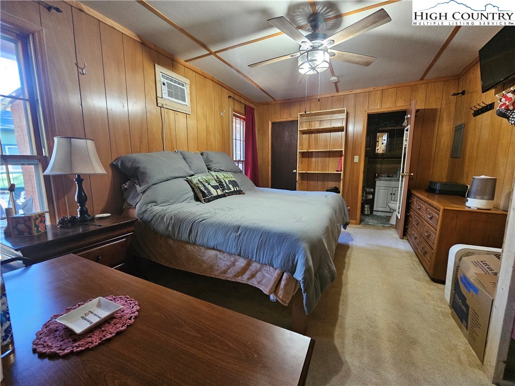 184 Trillium Road Newland, NC 28657 - Photo 4 of 15 a bedroom with a bed window and dresser
