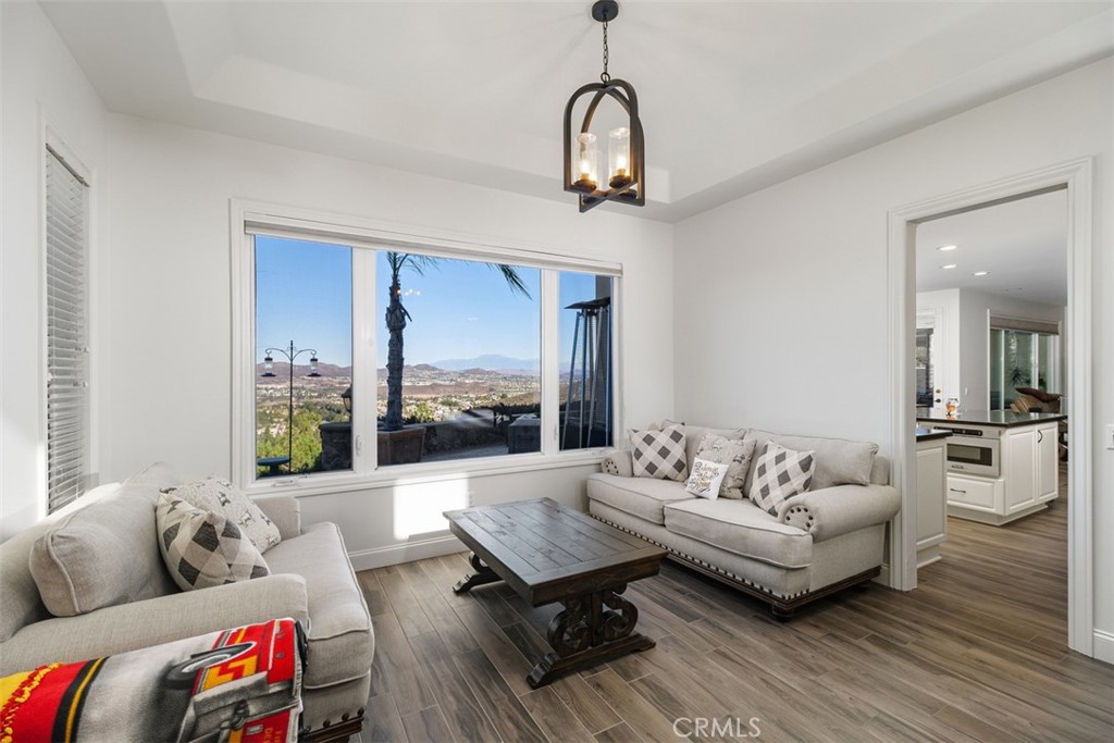 37964 Pinnacle Court Murrieta, CA 92562 - Photo 13 of 47 a living room with furniture and wooden floor