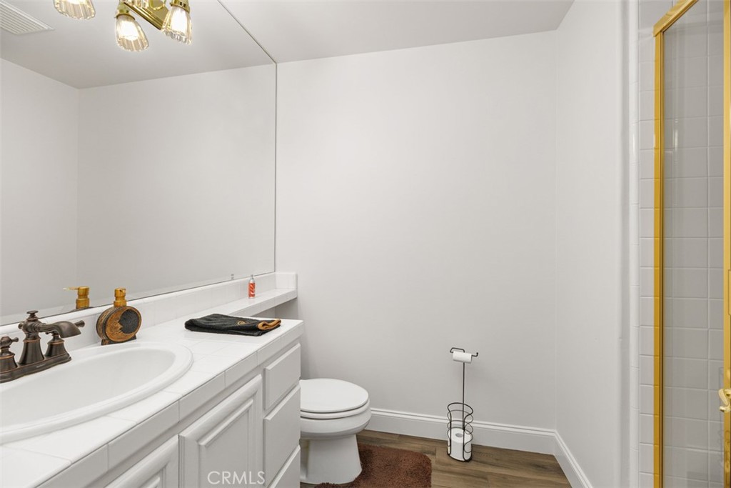 37964 Pinnacle Court Murrieta, CA 92562 - Photo 25 of 47 a bathroom with a sink and a toilet