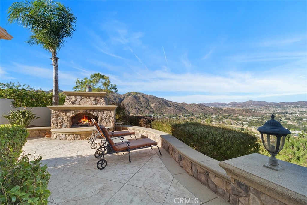 37964 Pinnacle Court Murrieta, CA 92562 - Photo 44 of 47 a view of a terrace with a bench
