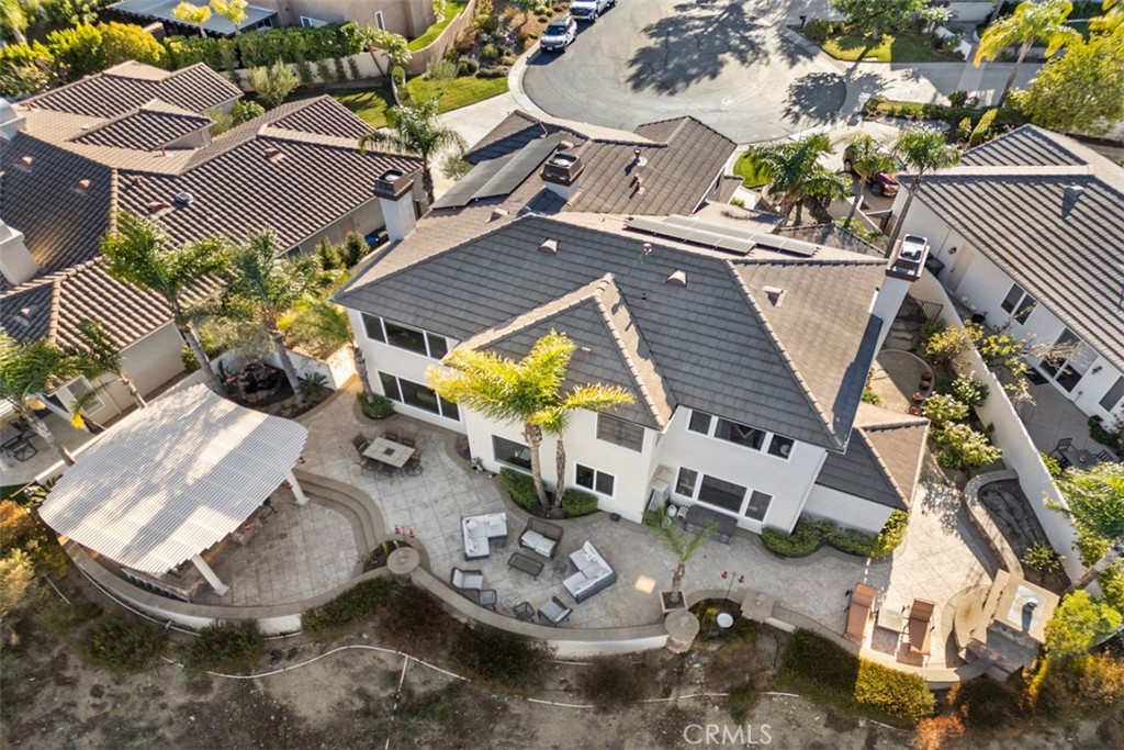 37964 Pinnacle Court Murrieta, CA 92562 - Photo 5 of 47 an aerial view of a house with garden space and a patio