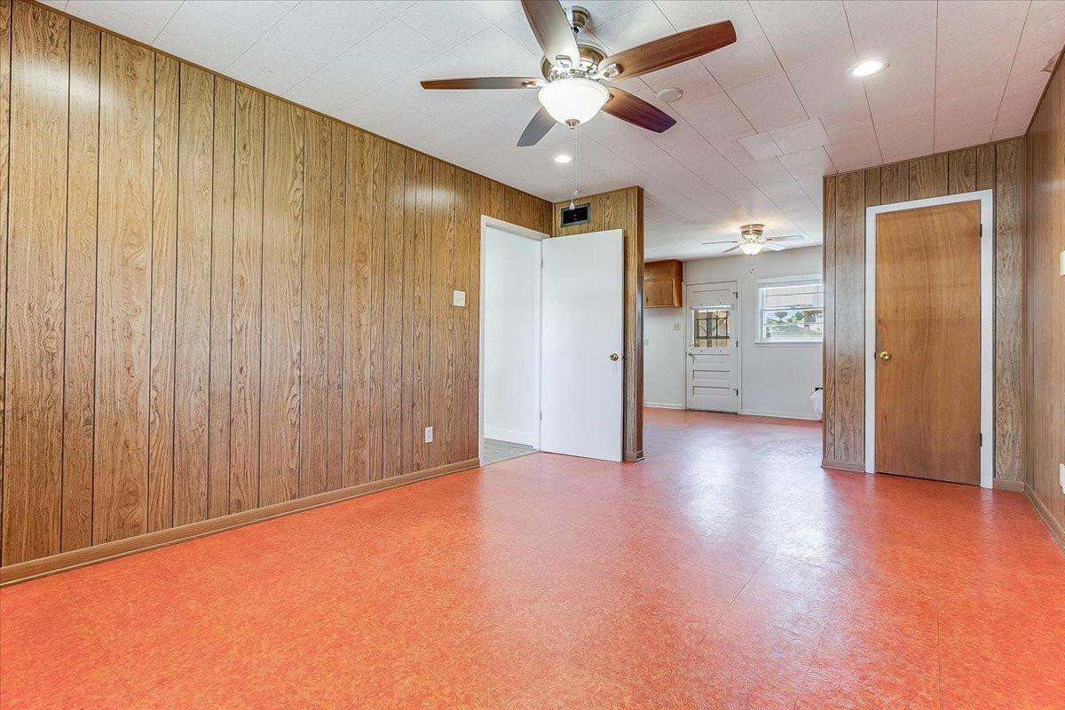 2801 62nd Street Lubbock, TX 79413 - Photo 16 of 21 a view of a livingroom with a ceiling fan & a ceiling fan