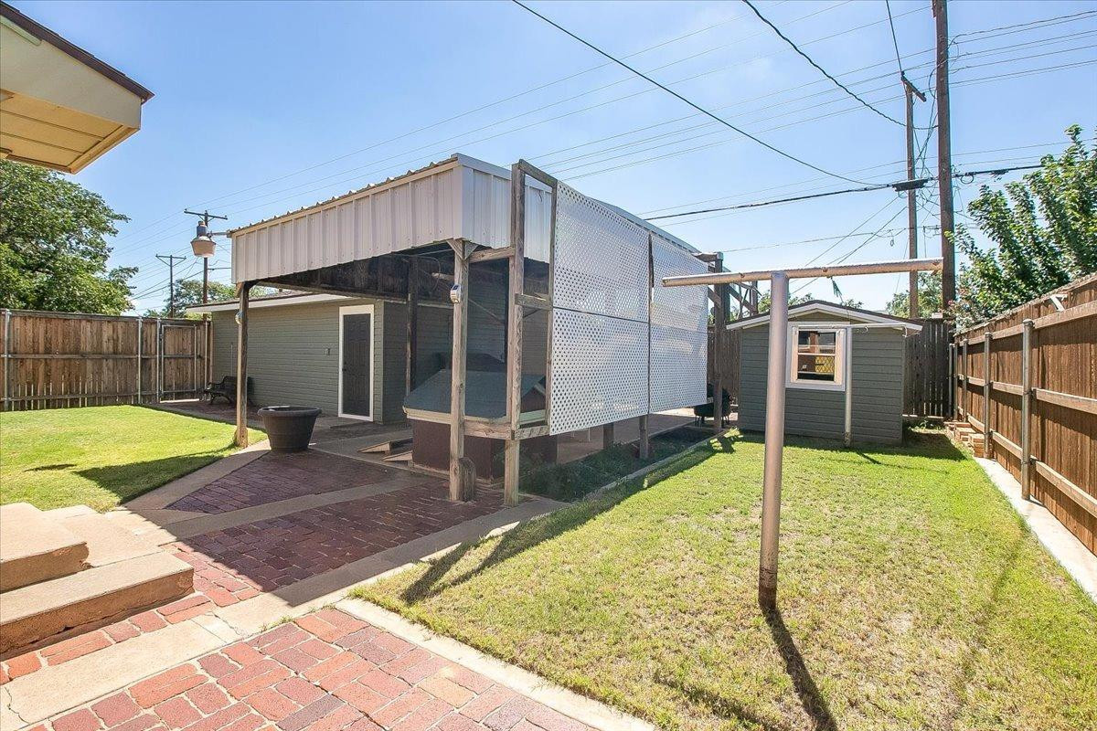 2801 62nd Street Lubbock, TX 79413 - Photo 3 of 21 a view of a house with backyard and sitting area
