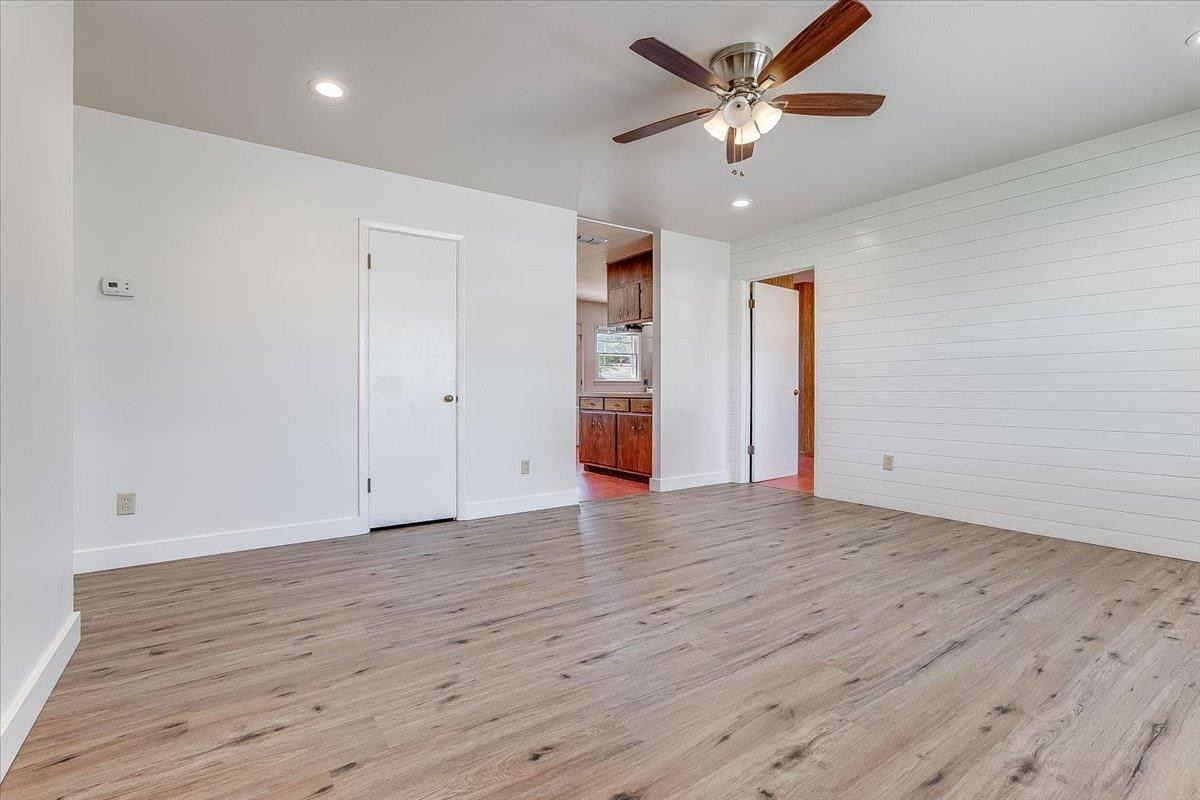 2801 62nd Street Lubbock, TX 79413 - Photo 8 of 21 a view of an empty room with a ceiling fan
