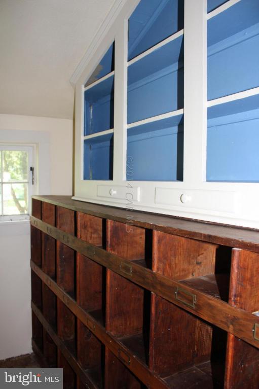 20633 Nanticoke Road Nanticoke, MD 21840 - Photo 22 of 46 a close view of wooden cabinets